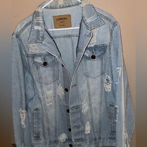 Light wash blue denim jacket with distressed details